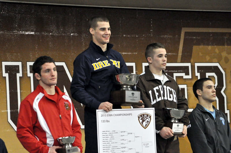 Devoy on the podium with his conference championship trophy. Photo by Justin Lafleur.