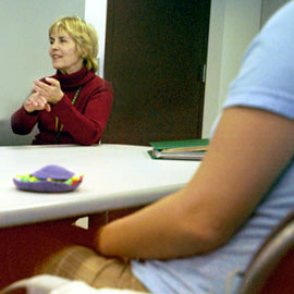 teacher at table