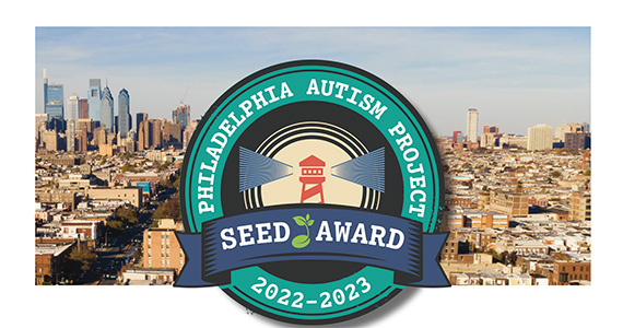 image of the philadelphia autism project logo on top of a photo of the city of philadelphia skyline view