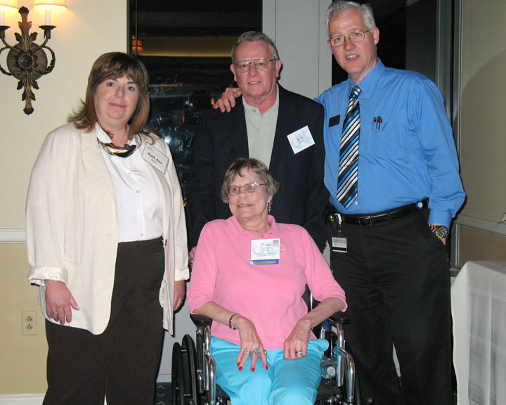 three alumni and Dr. Rocky Rockstraw