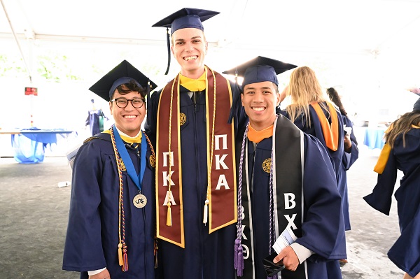 A group wearing Drexel University caps and gowns