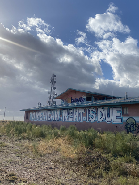 Navajo mural indicating that American rent is due