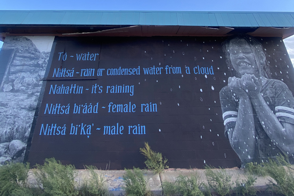 Navajo mural about rain featuring a young girl