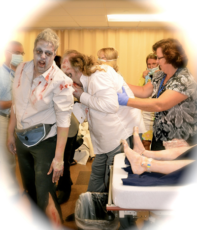 actors dressed as zombies for simulation experience