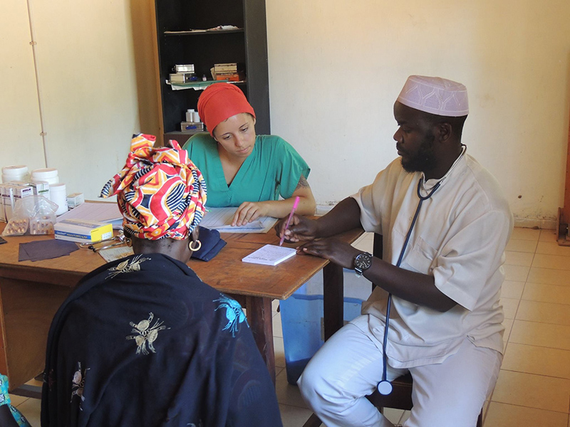 Drexel Chemistry Major Victoria Smith a doctor and a patient at a hospital in The Gambia