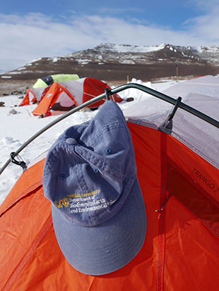 Ted Daeschler's Drexel hat hanging on a tent in Antartica
