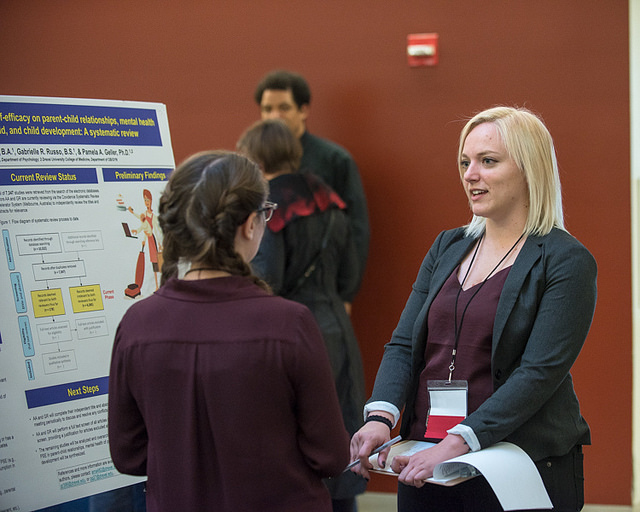 PhD student Mallory Clites presenting her poster