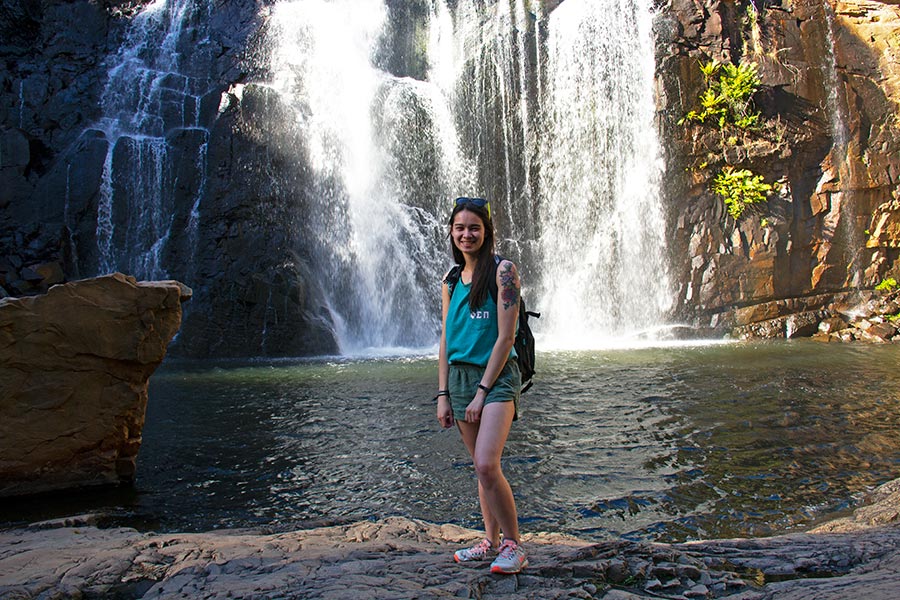 Student at a national park waterfall in Australia.