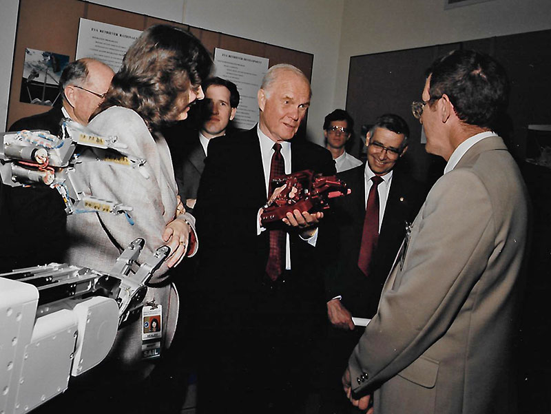 Senator John Glenn testing robotic grasping device