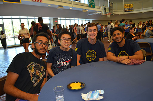 Group of new engineering students at welcome party.