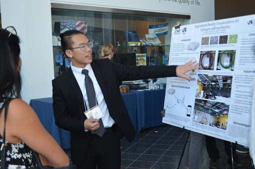 Electrical and computer engineering student Tommy Bui Nguyen explains his research.