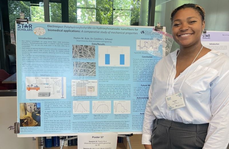 Peyton Buie with her poster presentation