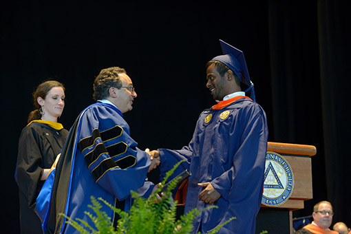 Dean Palmese congratulates the graduates.