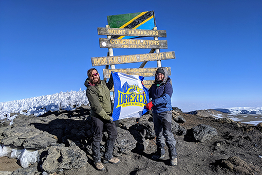 A Drexel Flag in unfurled at the top of Kilimanjaro.