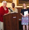 Drs. Diane Downs and Abioseh Porter with winner Britta Wolfrum