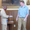 Dr. Abioseh Porter with winner Joseph Suchma