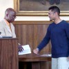 Dr. Abioseh Porter with winner Aby John