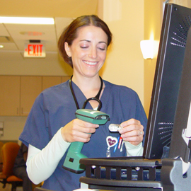 Female nurse student with wand and computer