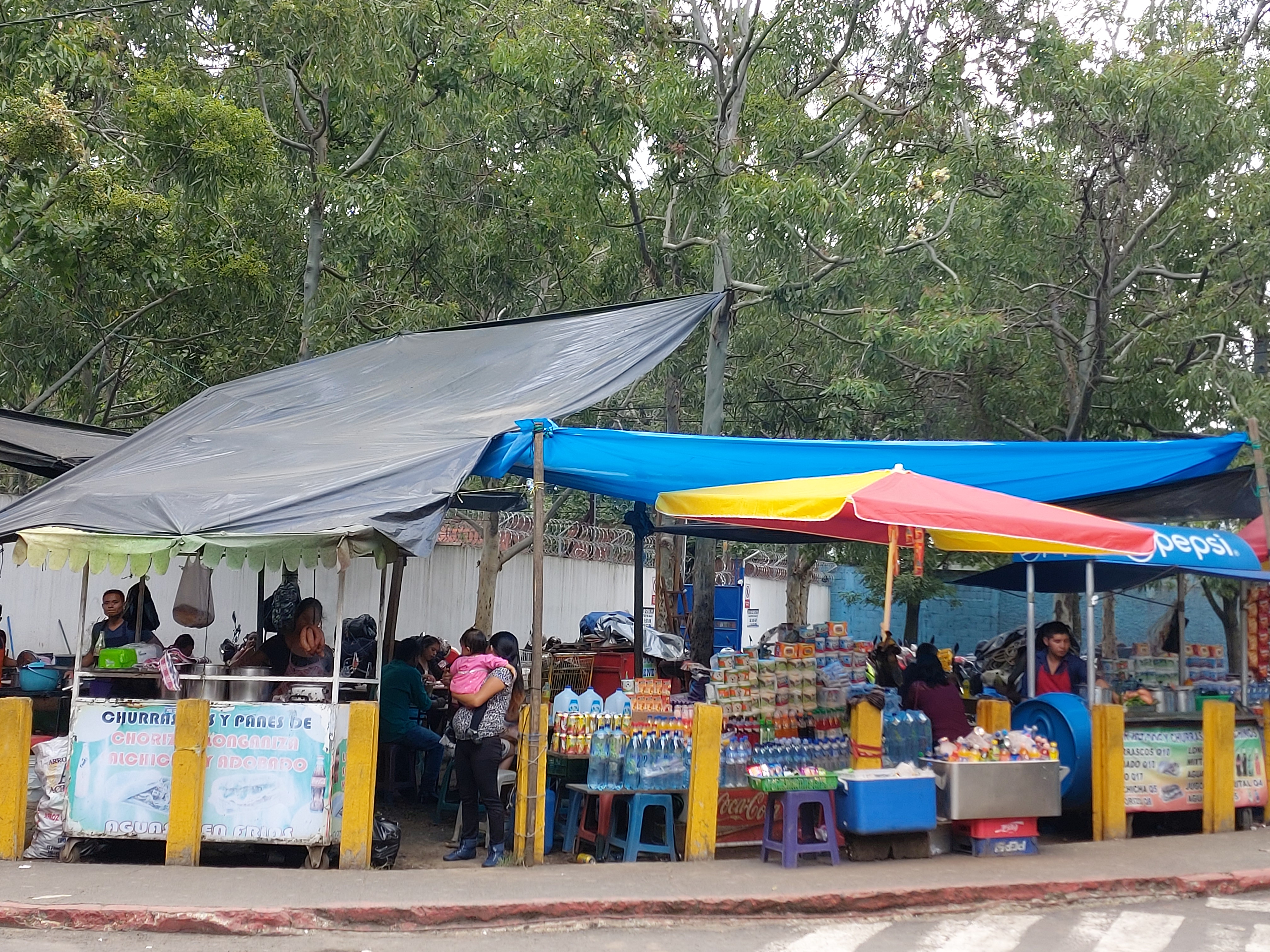 Informal-food-vendors-on-street-colorful-tents
