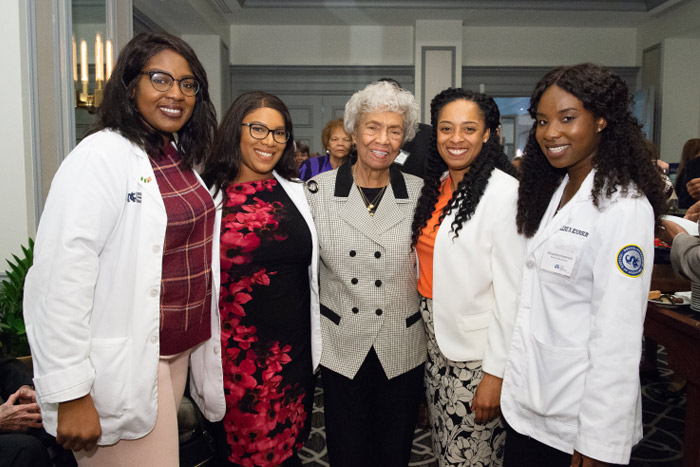 Gloria Twine Chisum with current Woman One Scholars
