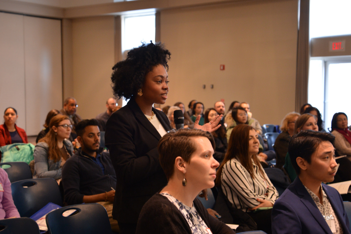 An attendee asks a question at the 2019 Sex and Gender Research Forum