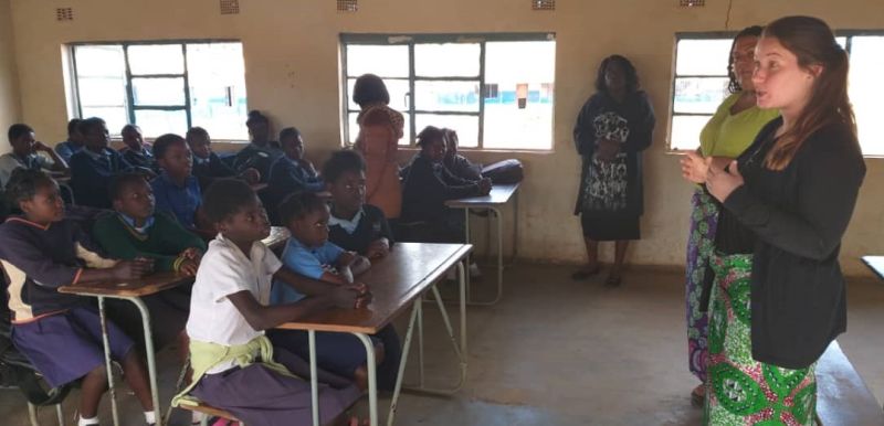 Katherine Boyd talking to a classroom during her global health experience in Chongwe, Zambia