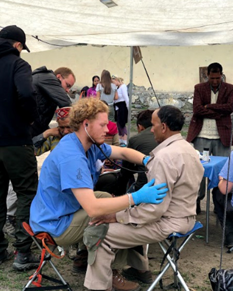 Drexel medical student Ridgley Schultz in the clinic during his Global Health Experience