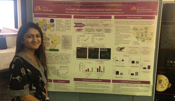 Bhumi Patel with her poster at the Mid-Atlantic Pharmacology Society's meeting