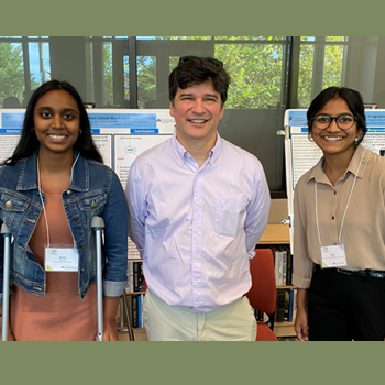 Dr. Reginato pictured with STAR Students Anna Ramesh and Madhu Karuppiah at 2023 STAR Scholars Poster Presentations.