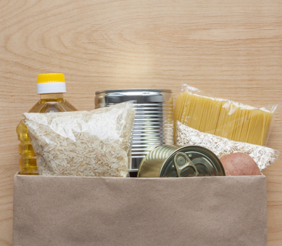 Grocery items in paper bag.