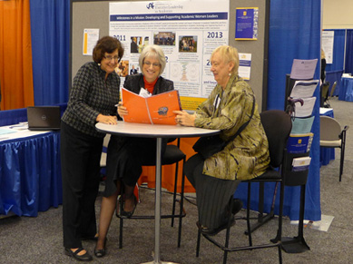 Barbara Schindler (ELAM '97), Rosalyn Richman, and Page Morahan meet at the ELAM booth at the 2012 AAMC meeting.
