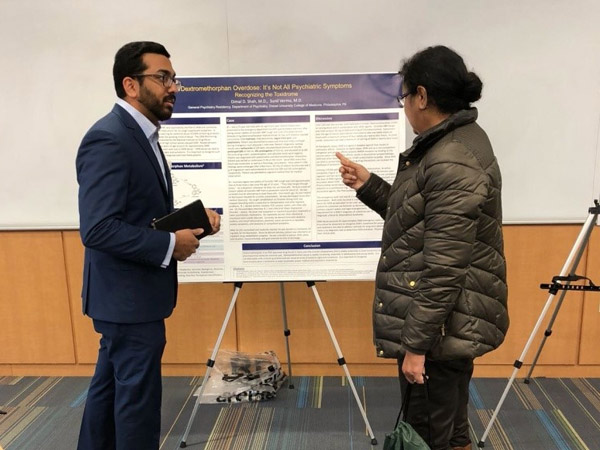 Dr. Shah presenting his research poster at the 2018 Addiction Symposium