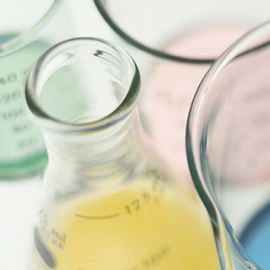 beaker and glass measuring bottles