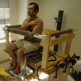 man in back study cage