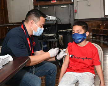 Child recieving a vaccination