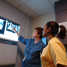 women looking at xrays