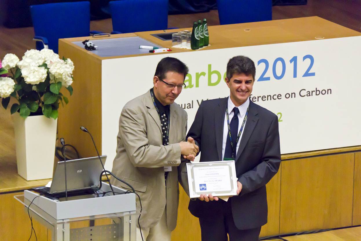 Distinguished University and Trustee Chair Professor Yury Gogotsi (right) receives the ECA Award in June 2012.