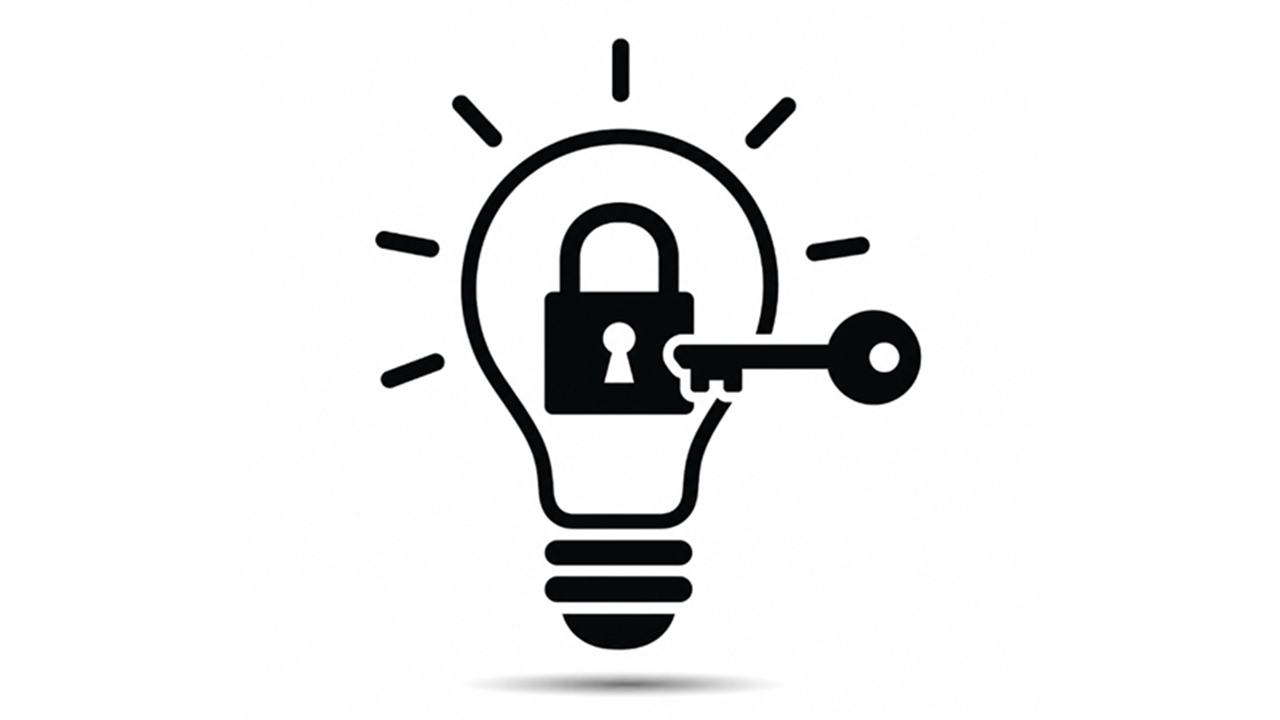 A lightbulb with a lock and key in it