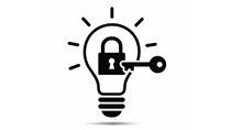 A lightbulb with a lock and key in it