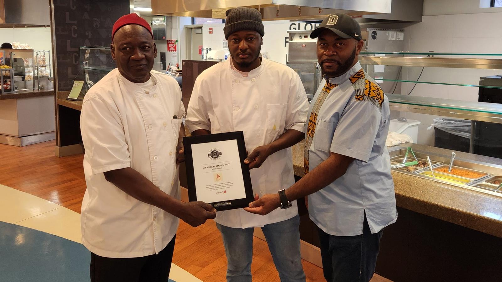 African Small Spot receiving an award for Most Unique Food from Aramark