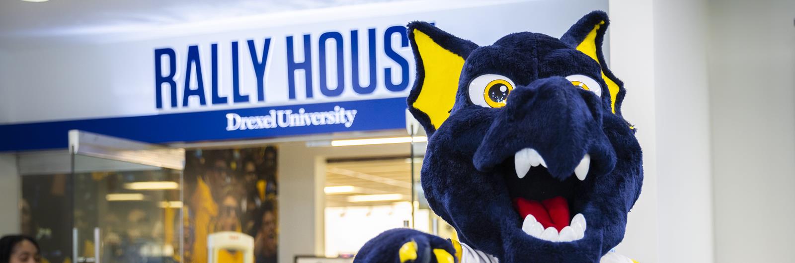 rally house sign with mario the dragon