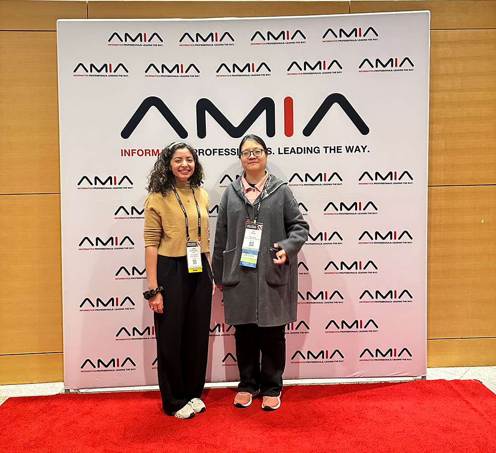 Poster presenters Bouzoubaa and Wang