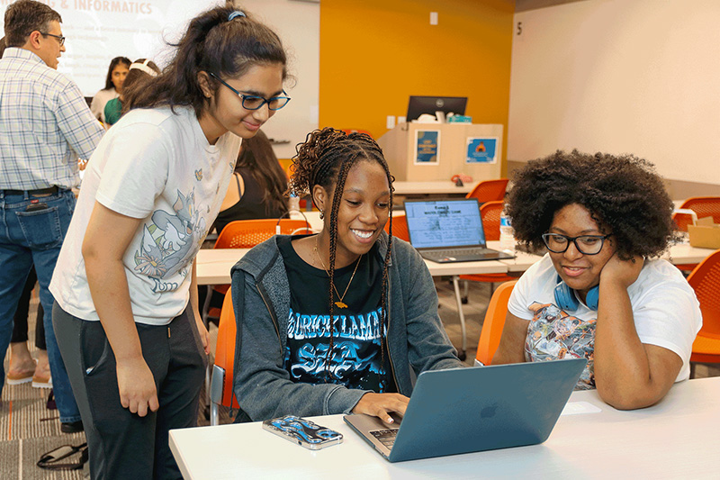 Students working together at CCI's Digital Development Camp, VirtuaQuest, 2025