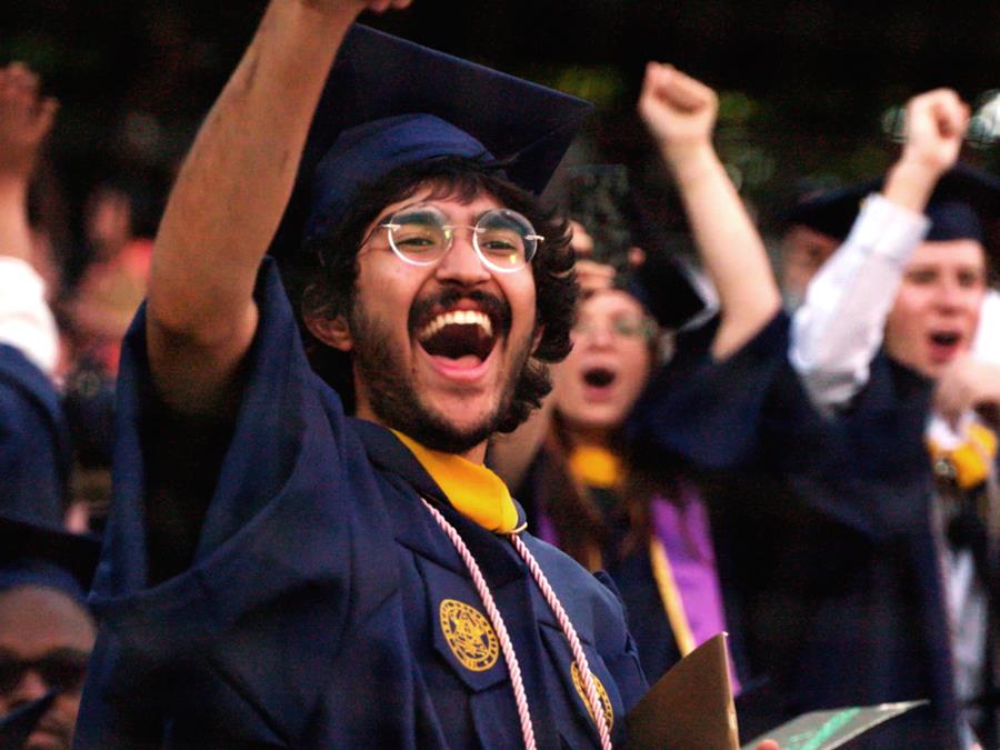 Drexel student cheering at graduation