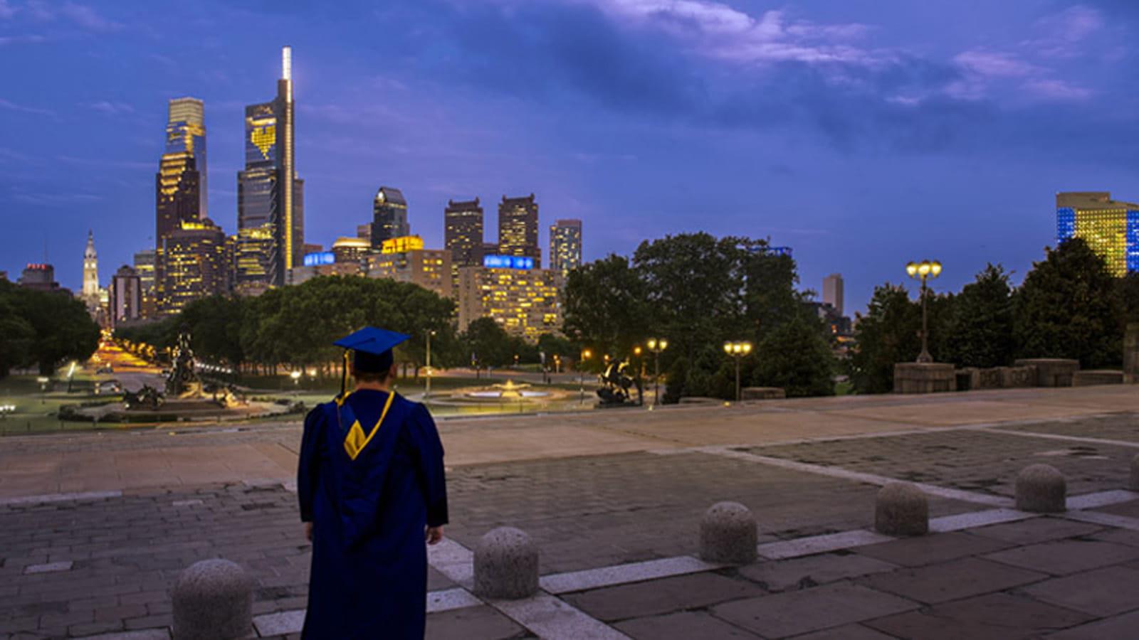 Graduate on Art Museum steps