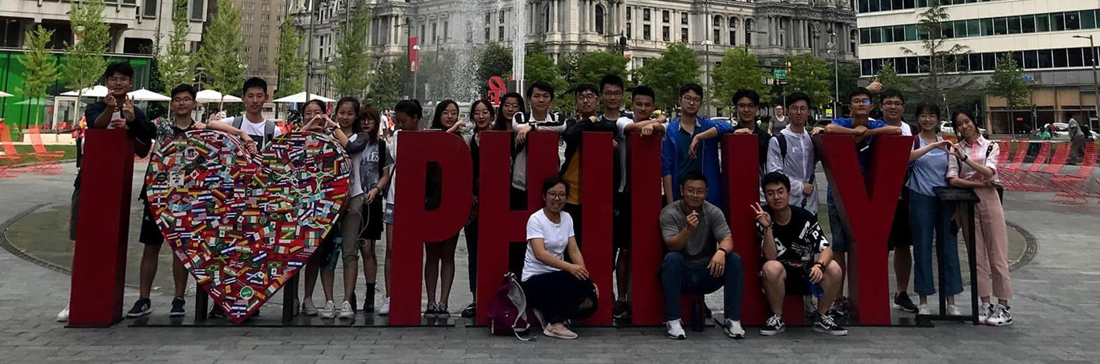 Drexel English Language Center scholars visit Philadelphia's historic City Hall courtyard.