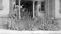 Drexel ROTC students sitting in front of the Main Building in 1919