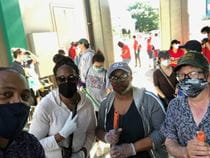 From left to right: Allen Riddick, Una Massenburg, Charlene Rice and Bo Solomon volunteering to clean the area near 52nd and Market streets on June 13.