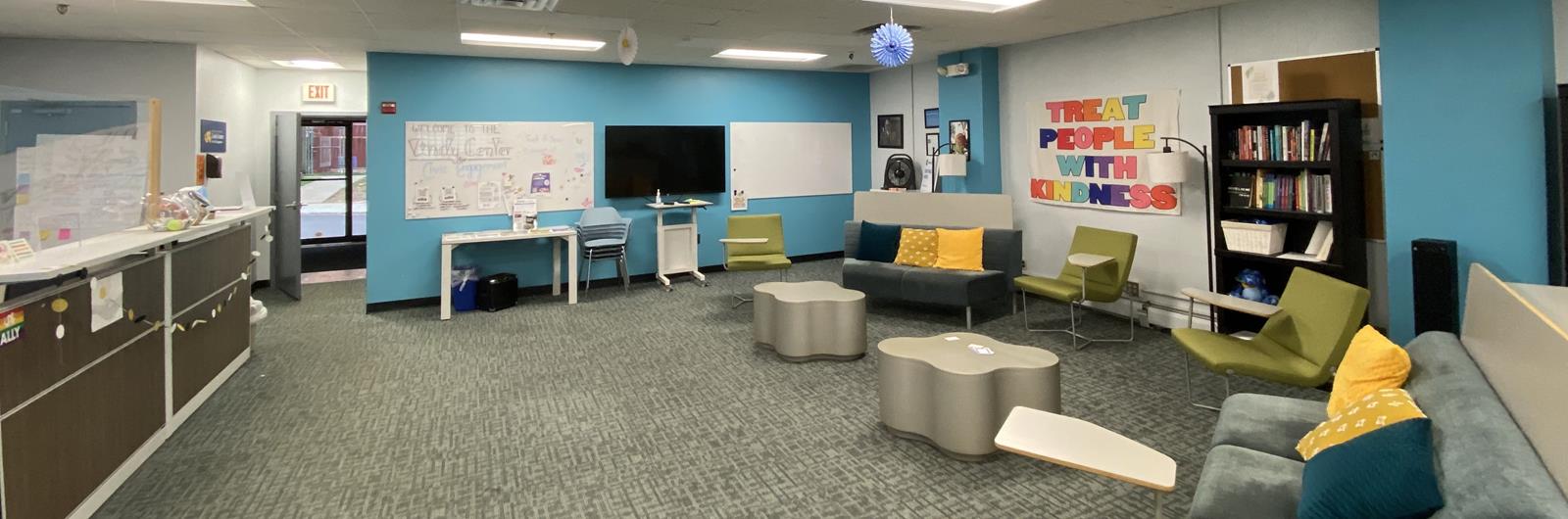 Lending Library interior with comfortable chairs and couches for reading