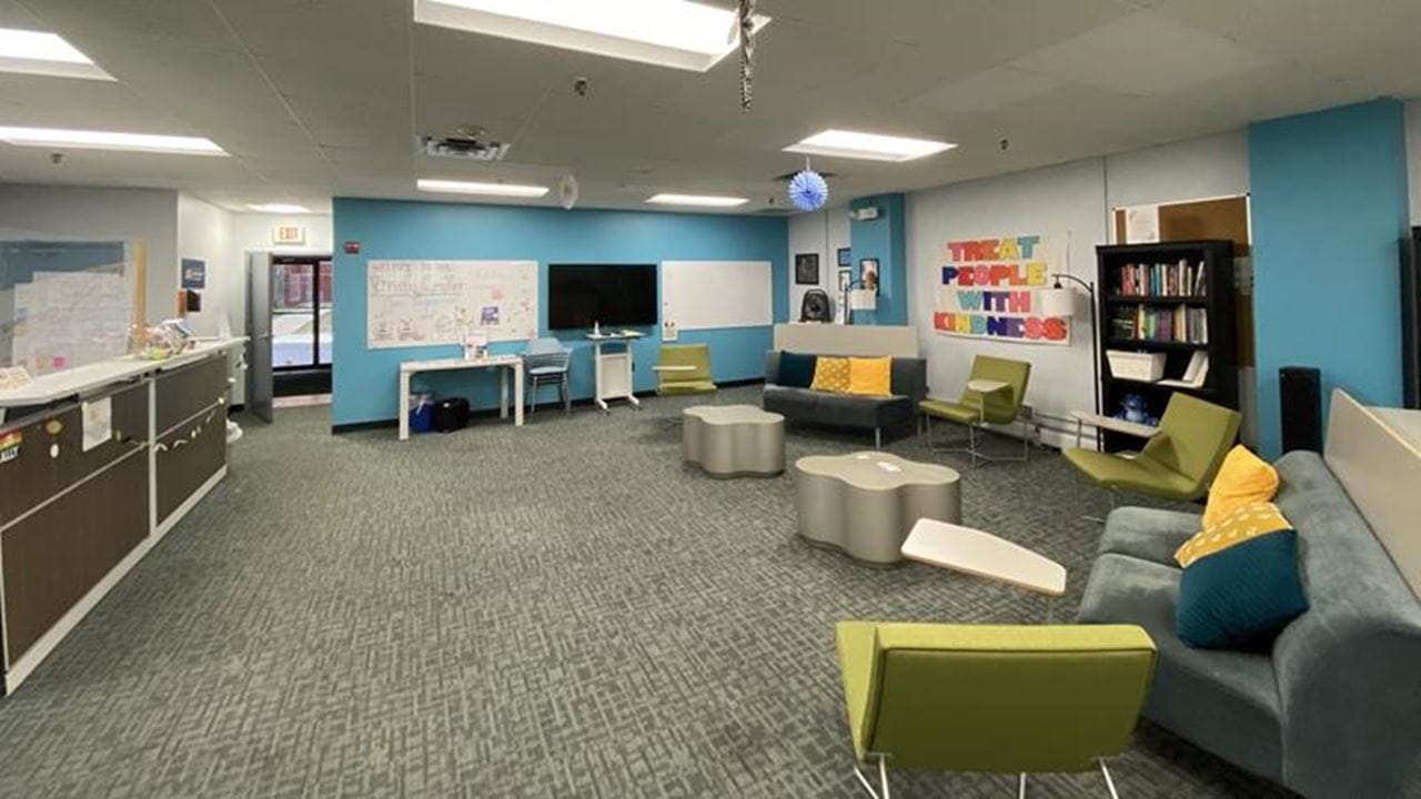 Lending Library interior with comfortable chairs and couches for reading